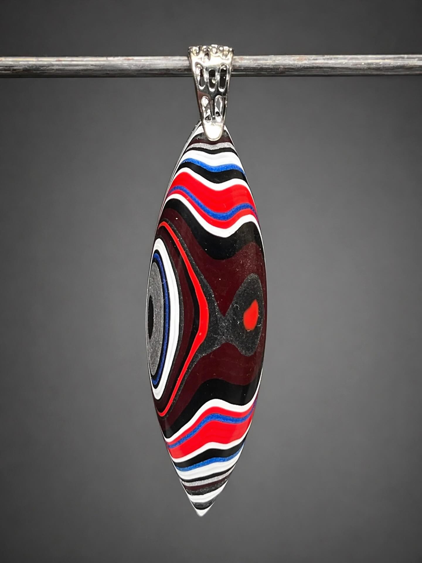 🚘😍🚘 
OH YEAH!!!
This pendant would go so well with the pair of earrings I just posted. This is a genuine MOPAR FORDITE pendant custom cut to showcase the gorgeous paint layers. This is very lightweight and can be worn on both sides. Definitely a collector’s pendant and part of our American automotive history. 
DM me for details.🥰
#fordite #forditejewelry #forditeearrings #zacharybloomjewelry #lapidaryjewelry