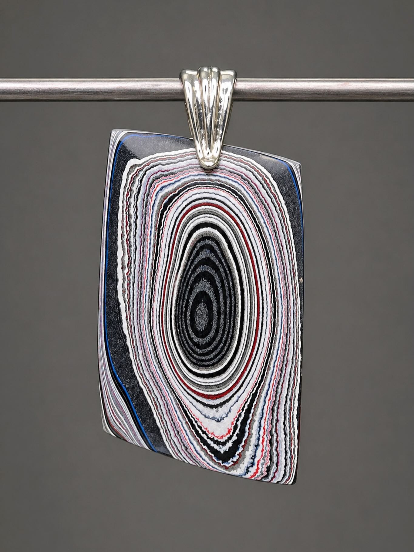 🚘😍🚘 
LOVE IT!
This is a genuine MOPAR FORDITE HEART pendant custom cut to showcase the gorgeous paint layers. This is very lightweight and can be worn on both sides. Definitely a collector’s pendant and part of our American automotive history. 
DM me for details.🥰
#fordite #forditejewelry #forditependant #lapidaryjewelry #zacharybloomjewelry